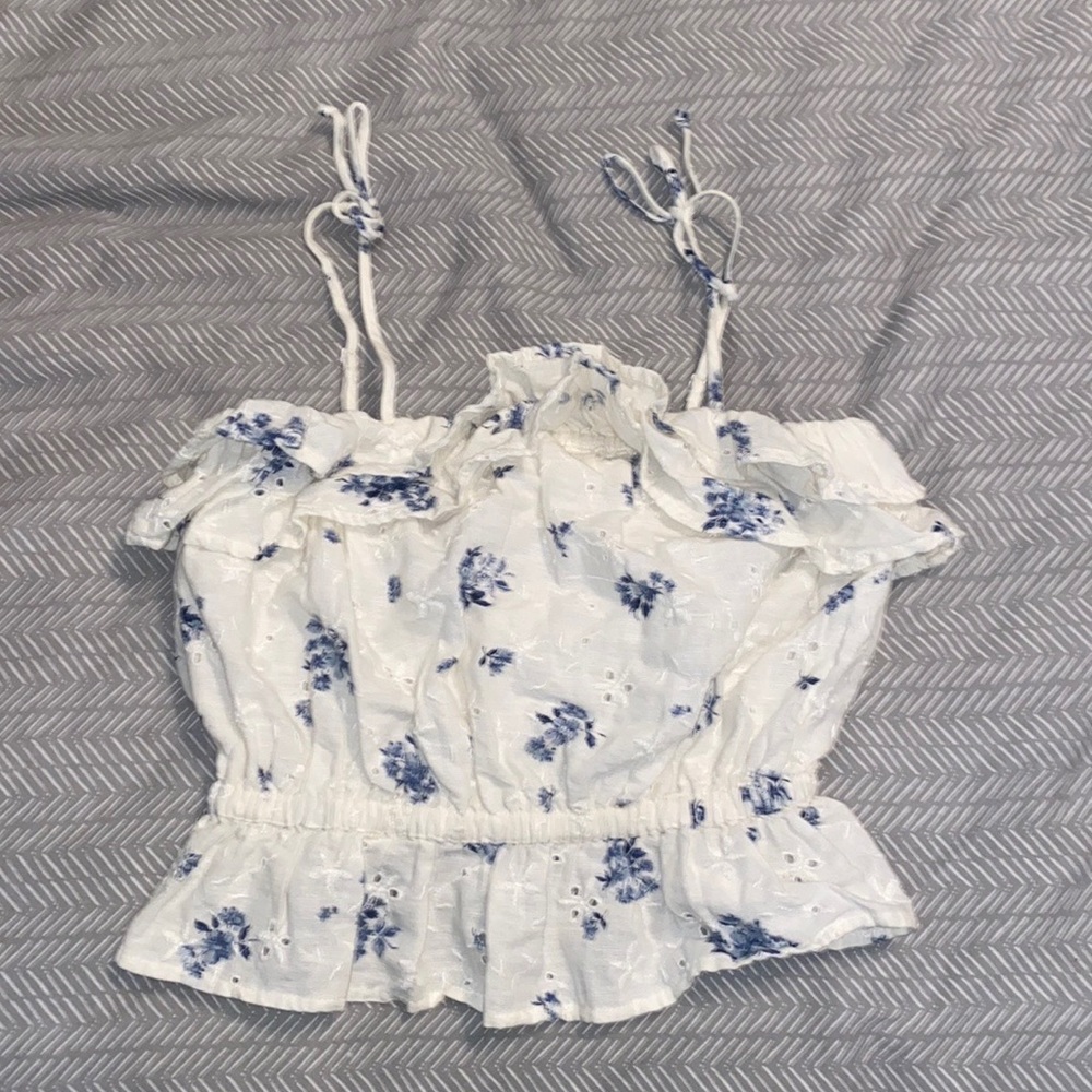 American Eagle white tank top with blue floral patterns